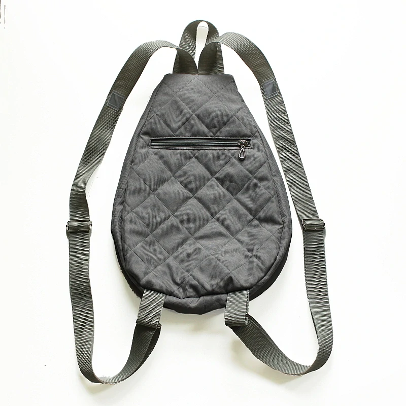 Malý batoh,popruhy přes obě ramena. Výška 34cm x 26 cm
